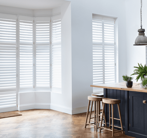 large kitchen windows using full height shutters