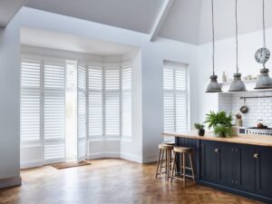 white full height kitchen door and window shutters